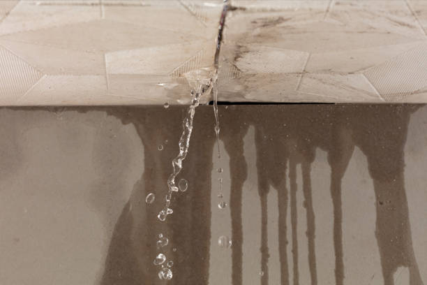 Professional Flood Damage Cleanup technician working in East Andover, ME